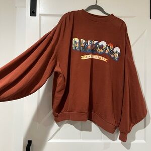 MODISH REBEL- Burnt Orange Sweatshirt L